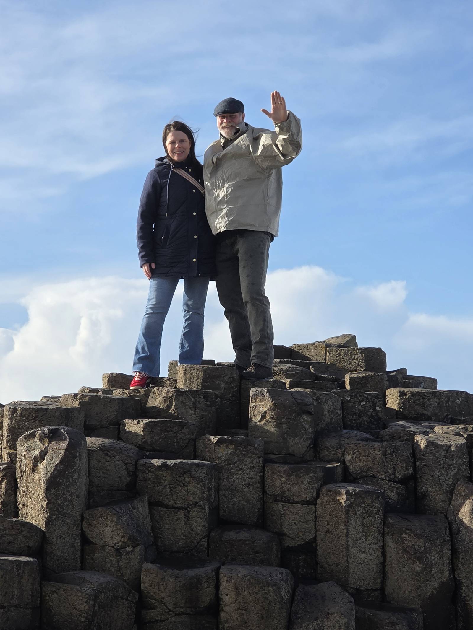 Jon and his wife standing on the basalt columns of the Giant's Causeway